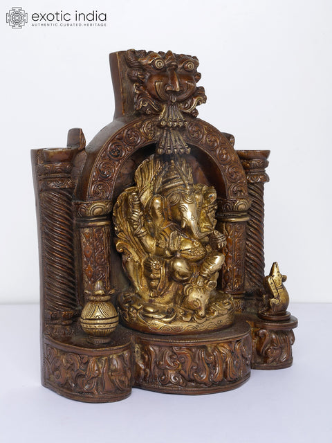 10" Temple Ganesha with Twin Lamps and Kirtimukha Atop | Brass Statue
