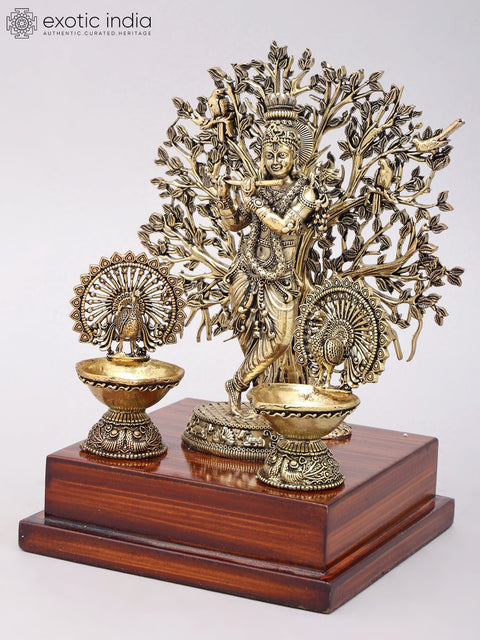 8" Superfine Fluting Lord Krishna with Beautiful Tree as Backdrop | Brass Statue on Wood Base