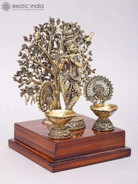 8" Superfine Fluting Lord Krishna with Beautiful Tree as Backdrop | Brass Statue on Wood Base