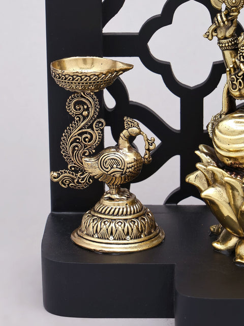 12" Jali Design Wood Framed Superfine Bhagawan Ganapati Statue in Brass with Peacock Lamps