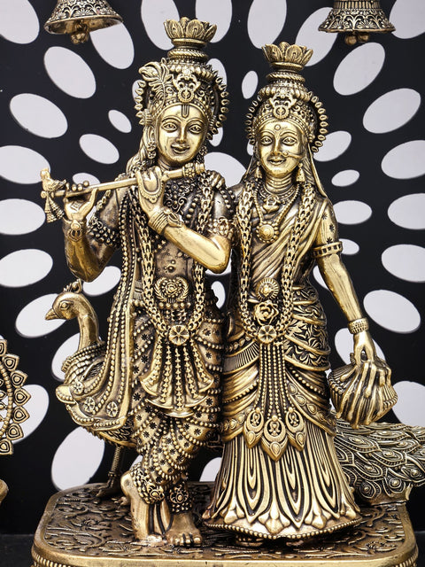 12" Superfine Divine Pair of Radha Krishna with Peacock Lamps and Bells | Brass Statue with Designer Wood Frame