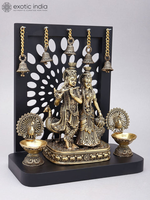 12" Superfine Divine Pair of Radha Krishna with Peacock Lamps and Bells | Brass Statue with Designer Wood Frame