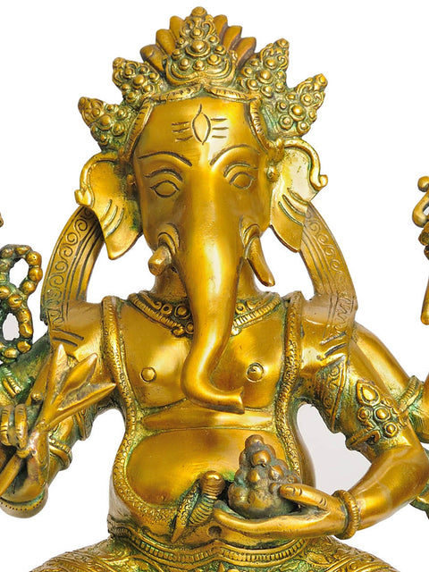 11" Four Armed Seated Ganesha In Brass