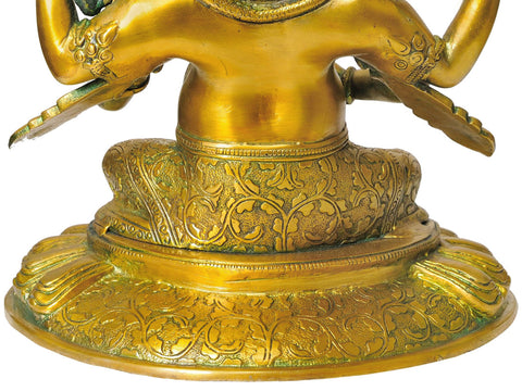 11" Four Armed Seated Ganesha In Brass