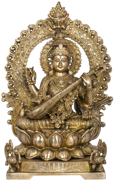 16" Goddess Saraswati Seated on Lotus Seat with Kirtimukha Aureole in Brass | Handmade | Made in India