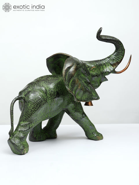 15" A Young Trumpeting Elephant With Long Tusks in Brass