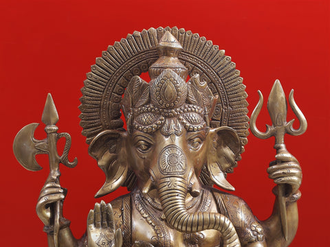 23" Ganesha Seated on His Rat Wearing a Leafy Crown In Brass