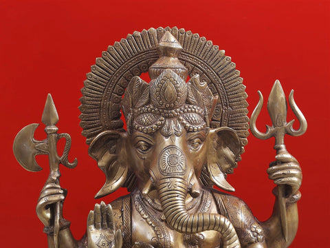 23" Ganesha Seated on His Rat Wearing a Leafy Crown In Brass