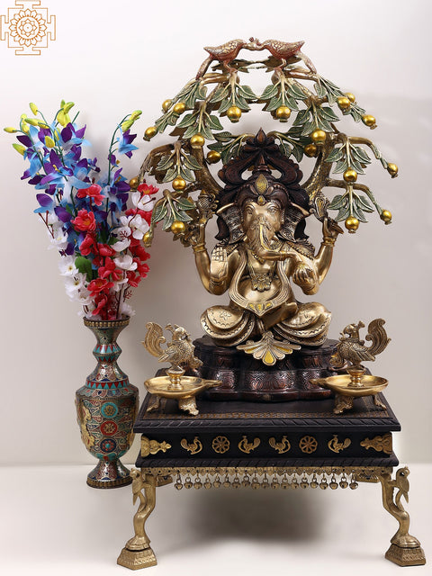 Wooden pedestal with Brass Ghungroos, Figures and Parrot Legs