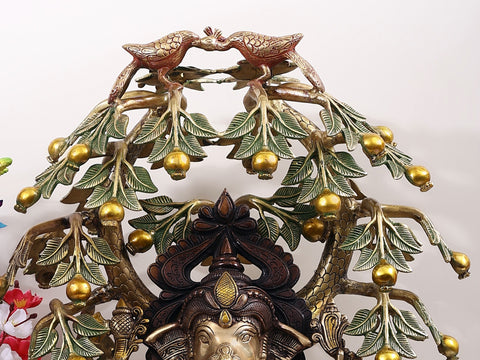 Wooden pedestal with Brass Ghungroos, Figures and Parrot Legs