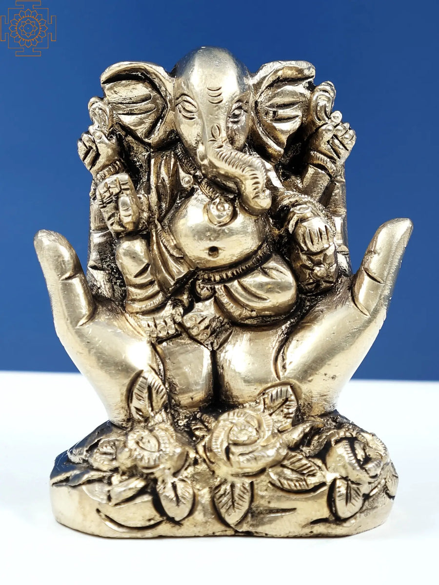 Fine Brass Statue of Four Armed Lord Ganesha Seated on Palm