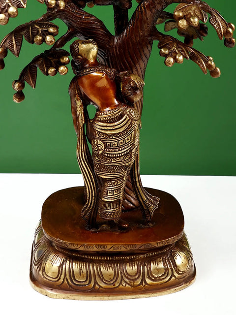 Krishna on a Tree with Radha Standing Under It
